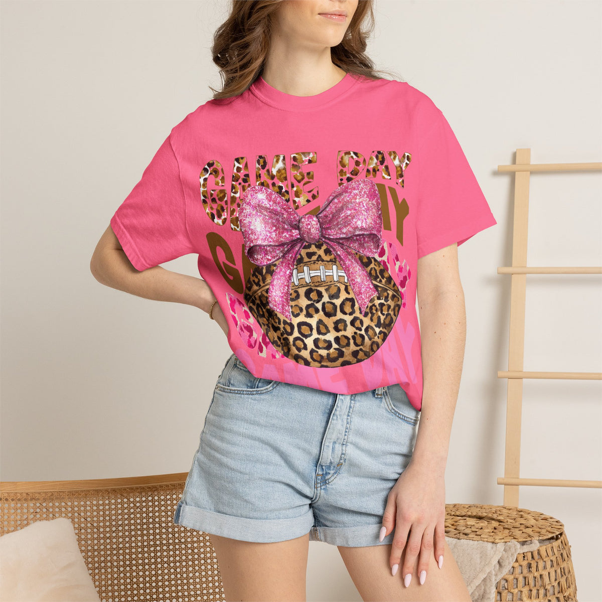Game Day Leopard Football T-Shirt with Pink Glitter Bow