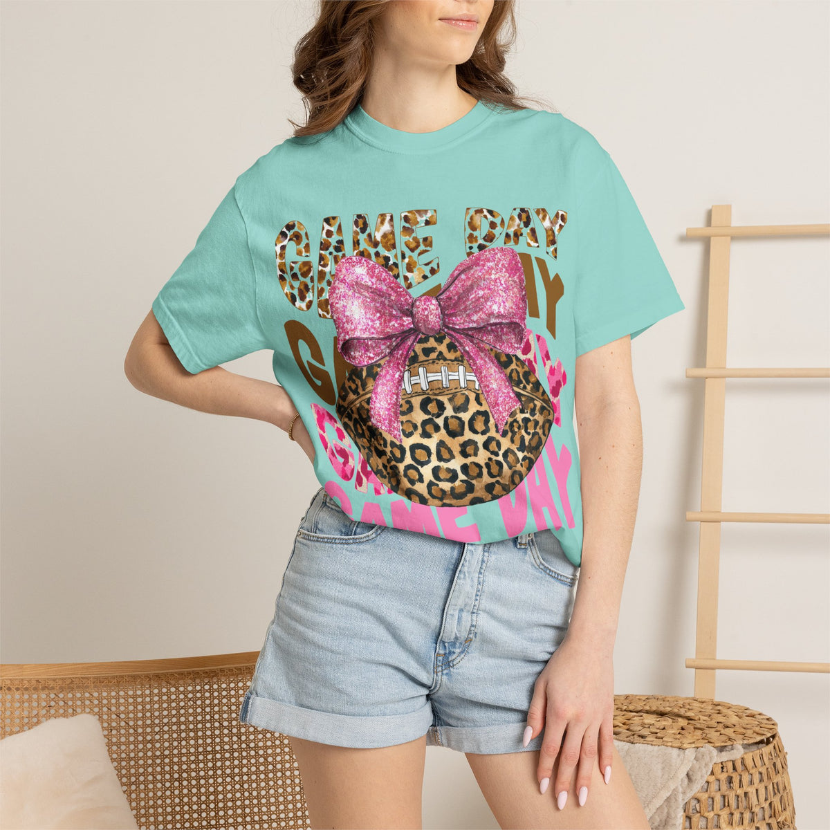 Game Day Leopard Football T-Shirt with Pink Glitter Bow